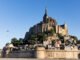 cuộc chiến của các nhà lãnh đạo ở Mont-Saint-Michel gây nguy hiểm cho việc bảo trì hàng trăm di tích khác như thế nào?